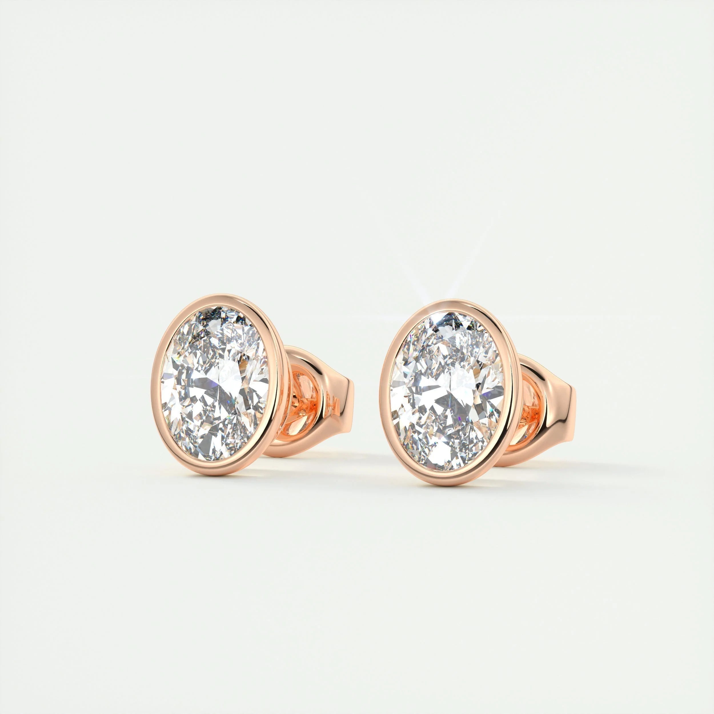 1.0 CT Oval Bezel Solitaire F/VS Lab Grown Diamond Earrings